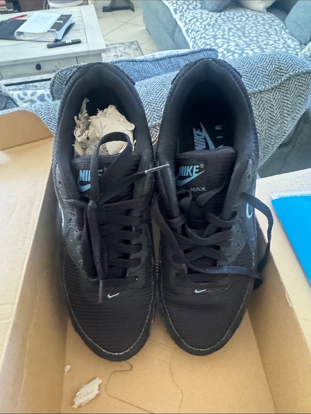 Nike Black Sneakers with Blue Nike Swoosh Accents